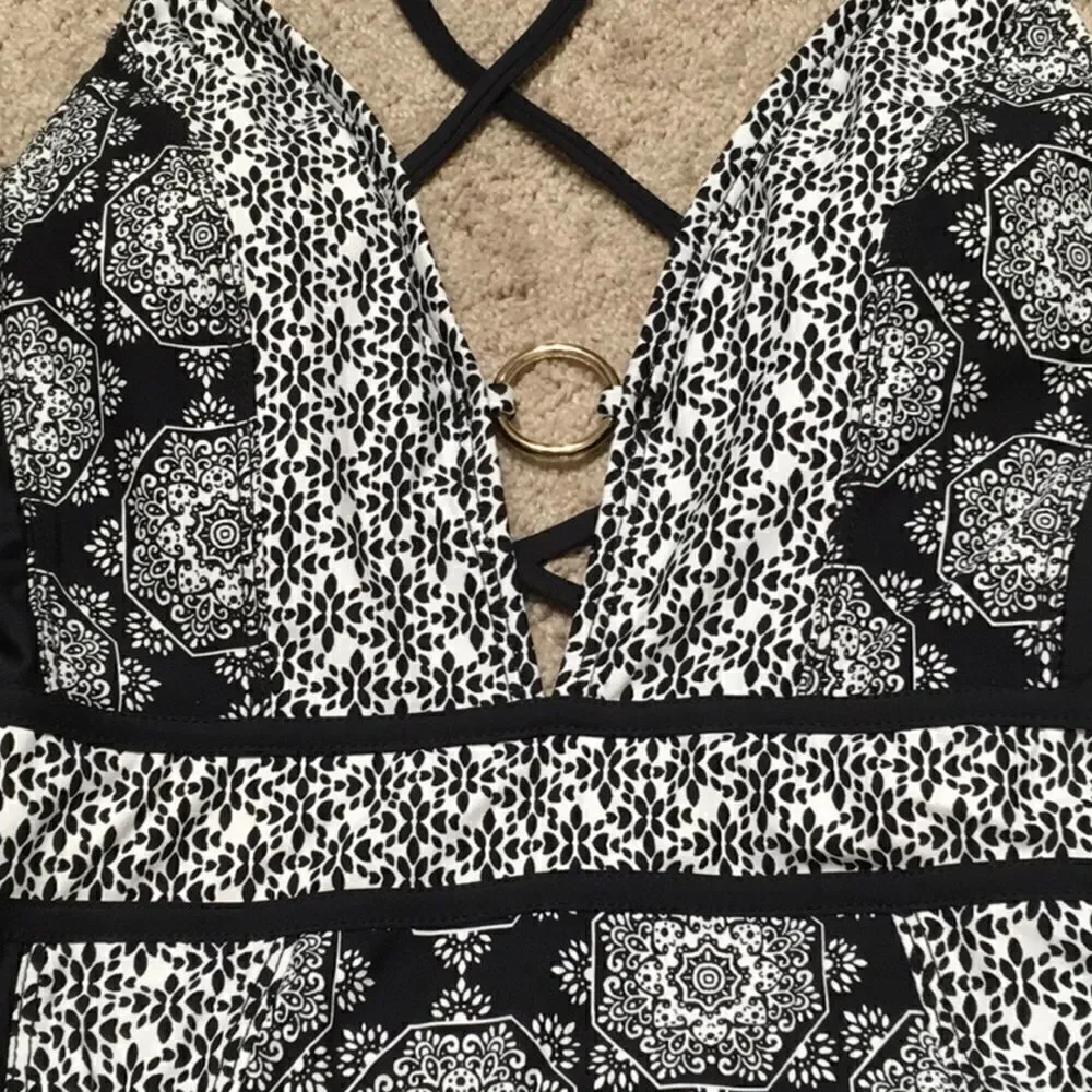 Medallion print plunge swimsuit. RUNS SMALL. NWOT